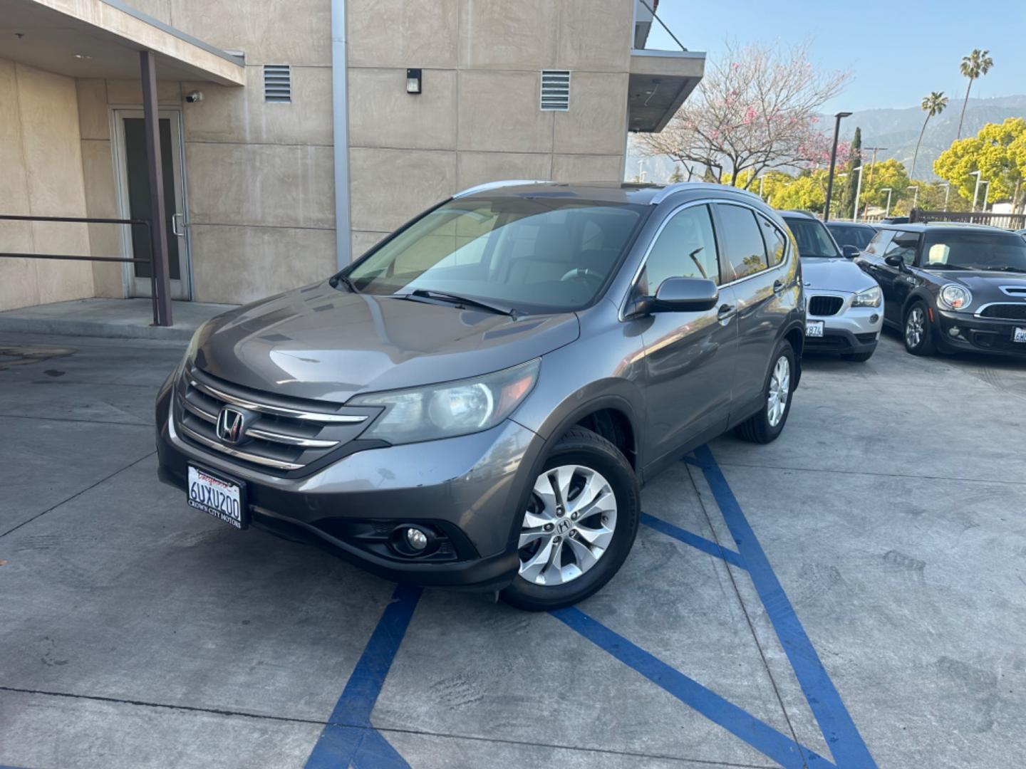 2012 Grey /Gray Honda CR-V EX-L 2WD 5-Speed AT (JHLRM3H78CC) with an 2.4L L4 DOHC 16V engine, 5-Speed Automatic transmission, located at 30 S. Berkeley Avenue, Pasadena, CA, 91107, (626) 248-7567, 34.145447, -118.109398 - Moon-roof! Leather seats! This 2012 Honda CR-V EX-L 2WD 5-Speed AT looks and drives good. - Photo#0